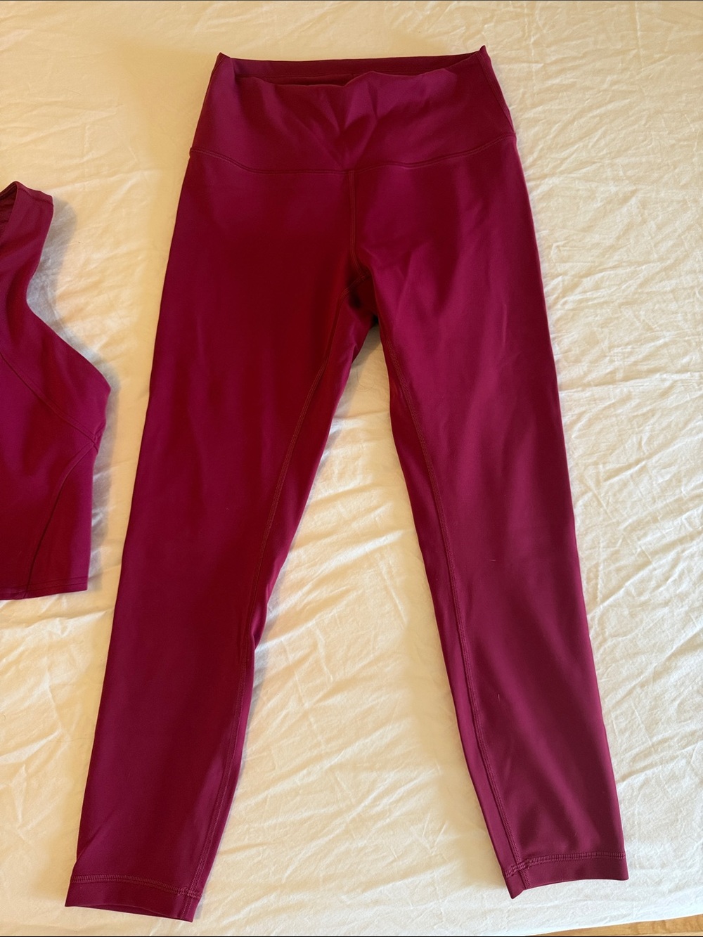 Lululemon Wunder Train High Rise Tight 25” in Pomegranate